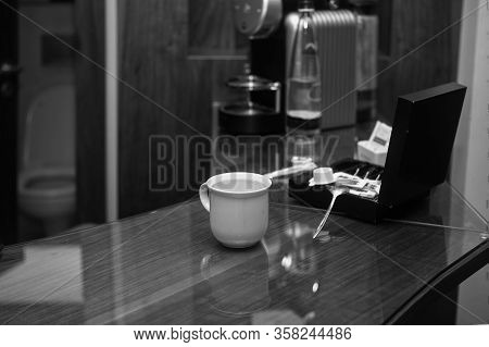 Black And White Image Of A Cup On The Breakfst Bar, Indoor Shot
