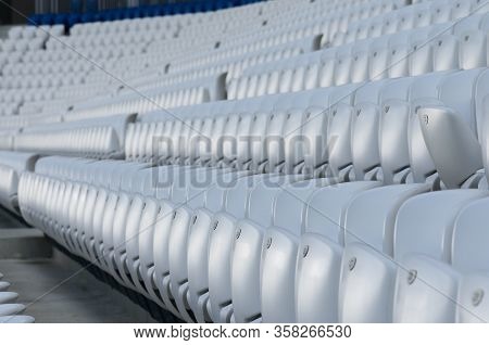Empty White Seats At The American Football Stadium During Isolation Period