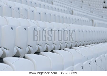 Empty White Seats At The American Football Stadium During Isolation Period