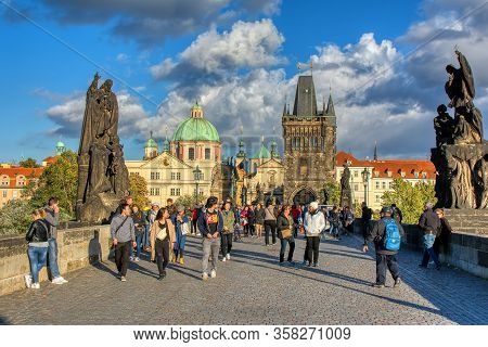 Prague, Czech Republic - September 24, 2018: People Crossing Charles Bridge (karlův Most). Historic 