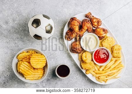 Table Fof Tasty Snacks For Beer Prepared For Watching Sports On Tv. Chicken. Chicken Wings, Chicken 