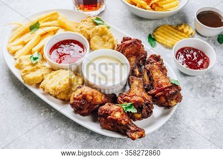 Table Fof Tasty Snacks For Beer Prepared For Watching Sports On Tv. Chicken. Chicken Wings, Chicken 