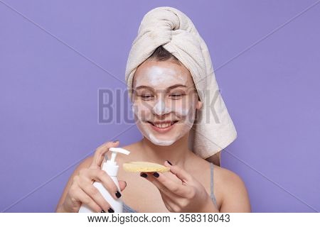 Portrait Of Smiling Sincere Beautiful Young Girl Having Spa Day, Clearing Her Skin, Use Cosmetologic