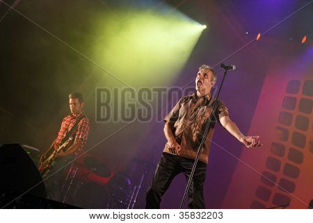 OLHAO โปรตุเกส - 9 สิงหาคม: GNR ทำ onstage ที่เทศกาลอาหารทะเลเมื่อ 9 สิงหาคม 2012 ใน Olhao