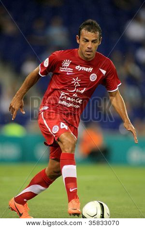 Barcellona - 3 agosto: Vitorino Hilton di Montpellier HSC in azione durante una partita amichevole contro il RCD 