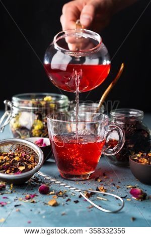 Process Brewing Tea, Tea Ceremony, Cup Of Freshly Brewed Fruit And Herbal Tea, Dark Mood.hot Water I