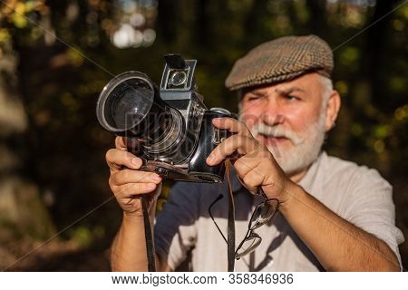 He Likes Birdwatching. Make Perfect Frame. Old Photographer Filming. Manual Settings. Pension Hobby.