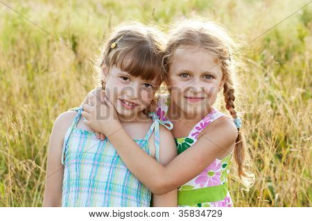 Two Pretty Funny Girl With Pigtails