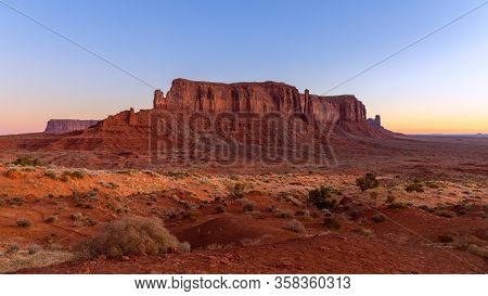 View Of Monument Valley In The Taime Of Beautiful Sunrise On The Border Between Arizona And Utah, Us