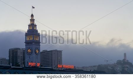 San Francisco, Usa - August 2019: Port Of San Francisco Clock Tower In The Evening