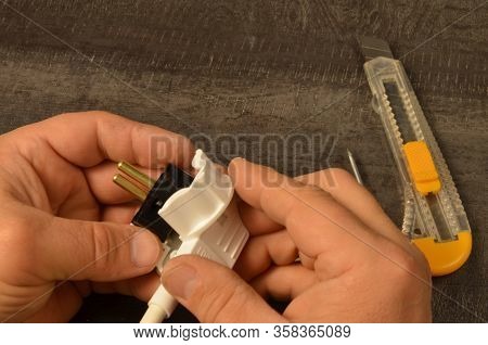 Assembly Of The Electrical Plug After Connecting To The Wire