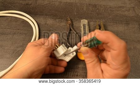 Assembly Of The Electric Plug After Connecting It To The Stranded Wire