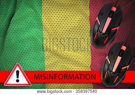 Mali Flag And Two Computer Mouses. Misinformation During Coronavirus Or 2019-ncov Virus Concept