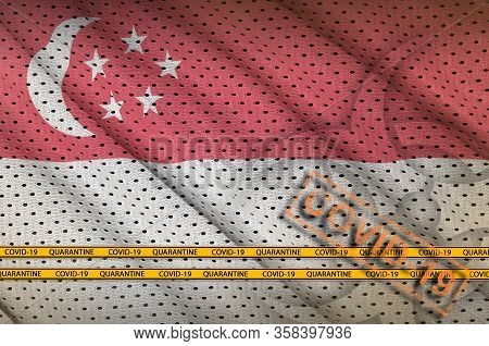 Singapore Flag And Orange Covid-19 Stamp With Border Tape. Coronavirus Or 2019-ncov Virus Concept