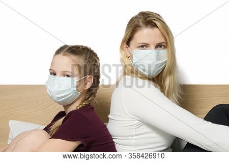 Daughter With Mom In Surgical Masks. Family With Kids In Face Mask Ffp1. Virus And Illness Protectio