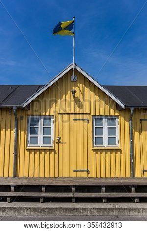 Yellow Wooden House At The Harbor Of Flensburg, Germany