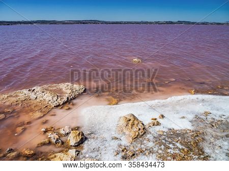 Laguna Salada In Torrevieja, Alicante Region, Spain. Pink Salted Lake. Salinas Natural Park.