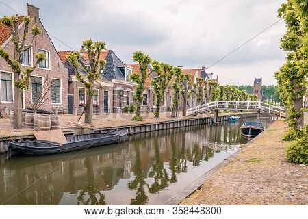 Old Dutch Town Of Sloten Friesland Netherlands With Historical Canals