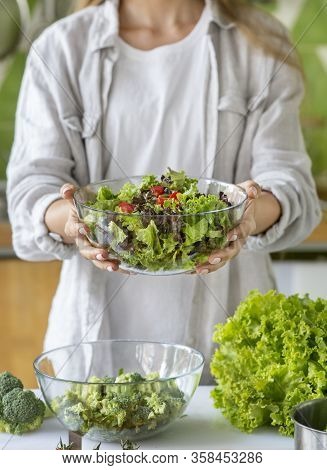 Superfood, Clean Eating, Vegan, Dieting Food Concept. Unrecognizable Woman Making Fresh Salad In The