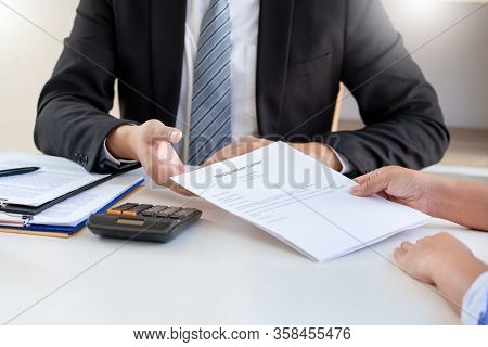 Businessman Sending A Resignation Letter To The Executive Employer Boss On Desk, Change Of Job, Unem