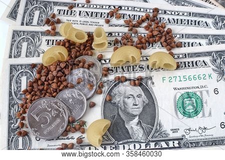 Coin Ruble On The Background Bills Dollar.