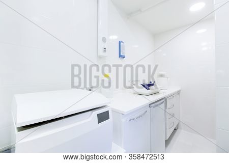 Sanitary Room For Professional Dental Tools Disinfection, White Interior, Copy Space