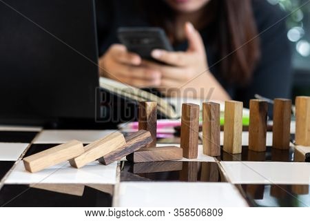Growing Business Concept. Business Woman Picking Domino Blocks For Filling The Missing Dominus And P