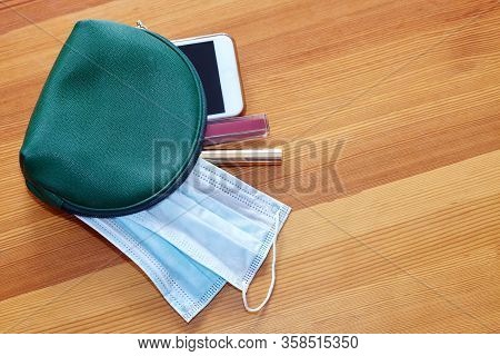 Green Woman Cosmetic Bag With Protruding Two Sanitary Masks, Mobile Phone, Lipstick And Make Up Penc