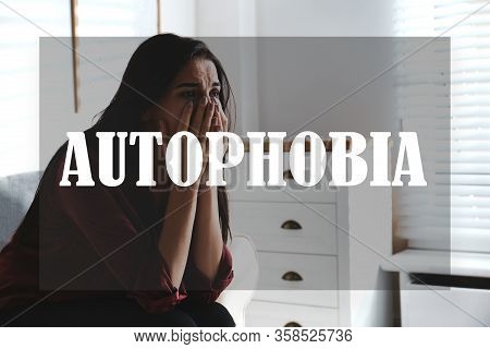 Depressed Young Woman Crying At Home. Autophobia