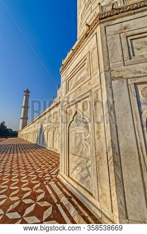 Agra, India - March 5 2018: Tourists Sighteseeing, Exploring And Admiring Famous The Taj Mahal