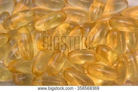 Vitaminen Omega 3 Fish Oil In Capsules On White Background.