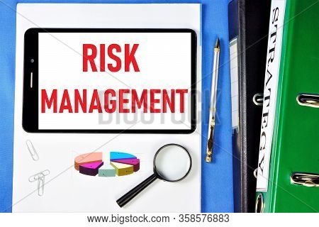 Risk Management-lettering On A Tablet Pc. Analysis Of The Probability And Consequences Of Adverse Ev