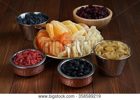 Slices Of Candied Ginger Root, Pieces Of Dried Mango Fruits, Dried Blueberries And Goji Berries, Dri