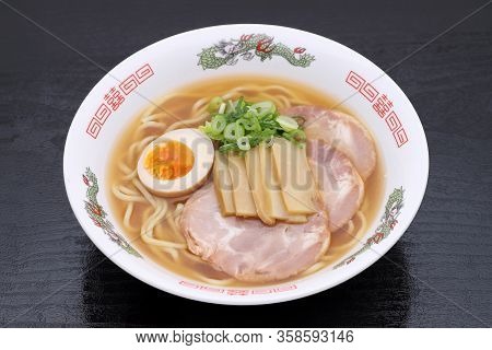 Japanese Miso Soup Ramen Noodles In A Bowl On Table