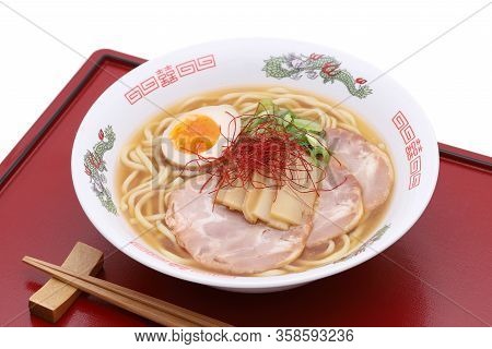 Japanese Miso Soup Ramen Noodles In A Bowl With Chopsticks On Tray