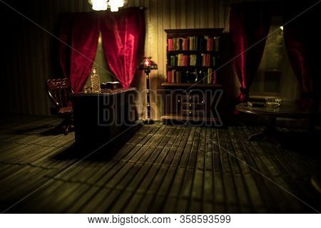 A Realistic Dollhouse Living Room With Furniture And Window At Night. Artwork Table Decoration With