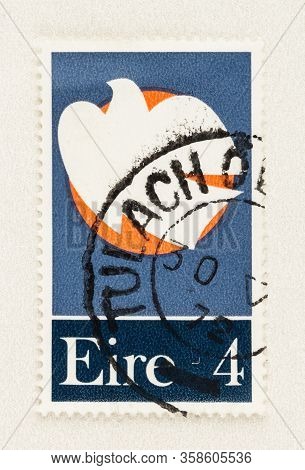 Seattle Washington - March 29, 2020: Close Up Of Ireland Postage Stamp Featuring Dove Soaring Past T