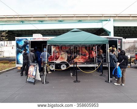 San Francisco - March 26, 2011:  People Checkout Mortal Kombat 9 Booth Outside Of Best Buy.  The Gam