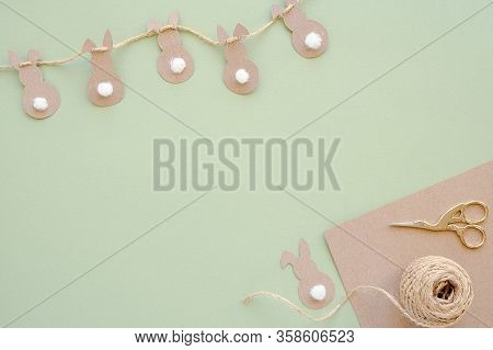 Festive, Children S Or Easter Decor. Garland Of Easter Bunny And Kraft Paper, Jute Twine, Scissors A