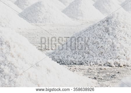 Not Sifted Sea Salt Piles In Evaporation Pond In Thailand