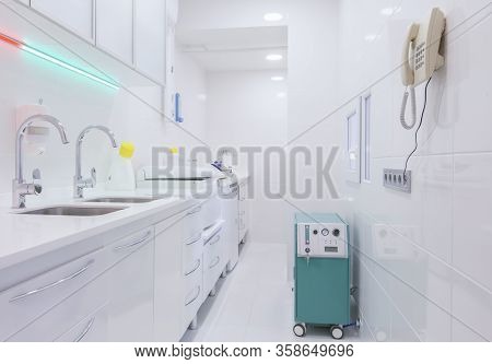 Tool Disinfection Room In Modern Dental Office, Full Sterilization, White Interior, Copy Space, Prof