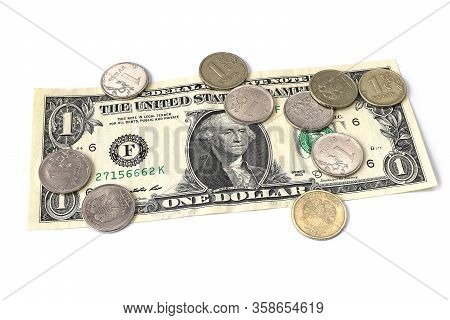 Coin Ruble On The Background Bills Dollar.