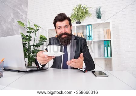 Help Yourself Please. Happy Businessman Serve Hot Cup At Desk. Project Manager Drink Tea During Work