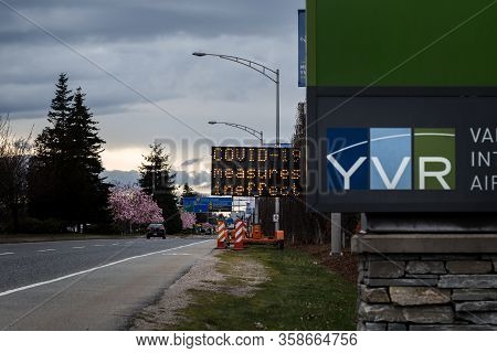 Richmond, Bc, Canada - Mar 29, 2020: An Electronic Road Sign At Yvr Airport Displaying Public Health