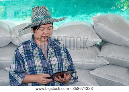 Smart Farmer Agriculturist With Organic Fertilizer