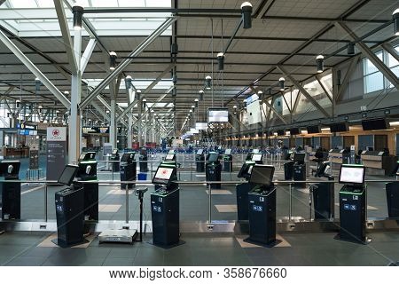 Richmond, Bc, Canada - Mar 29, 2020: International Departures Section Of Yvr Which Is Nearly Empty D