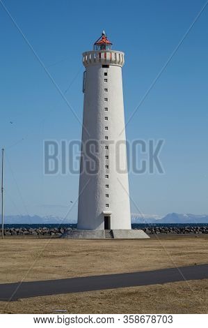 Small lighthouse on the tip of a peninsula