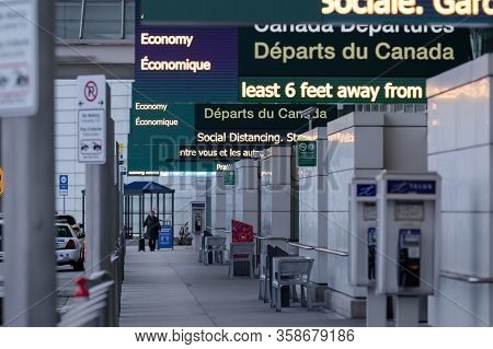 Richmond, Bc, Canada - Mar 29, 2020: Travellers In The International Departures Section Of Yvr Which
