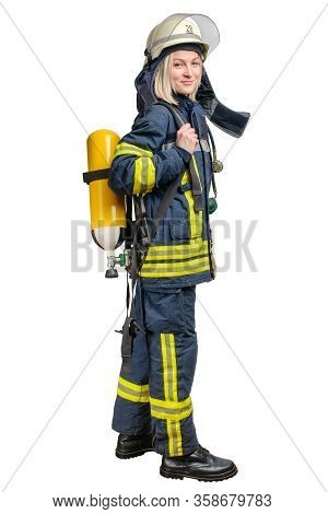 Young Woman Firefighter Wearing Uniform And Helmet With Breathing Air Cylinder Assembly And Full Fac