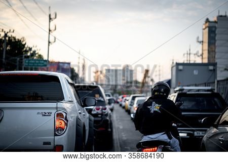 Cars On Busy Road In The City With Traffic Jam